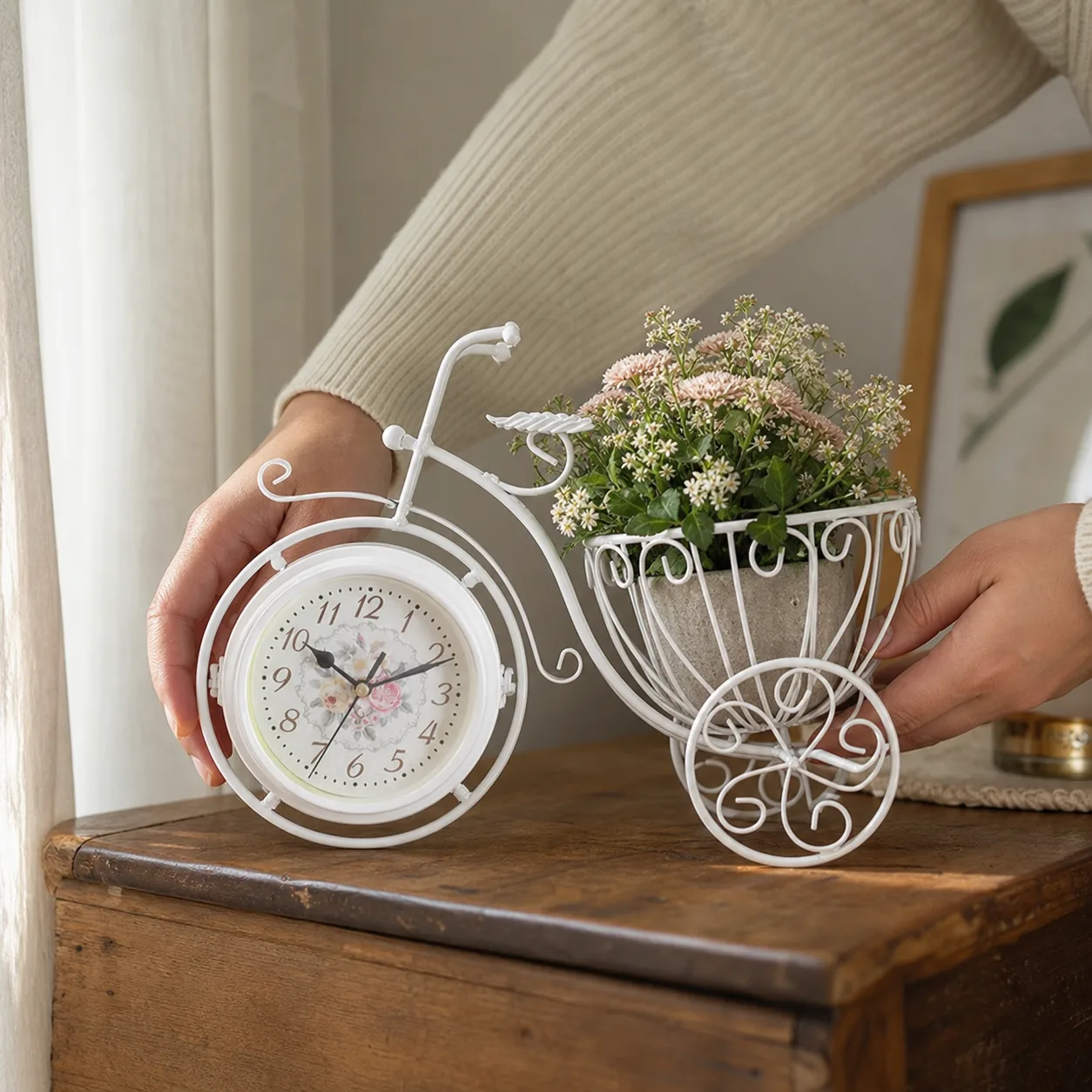 Vintage Bicycle Clock and Planter styled on a tabletop Vintage Bicycle Clock and Planter styled on a tabletop