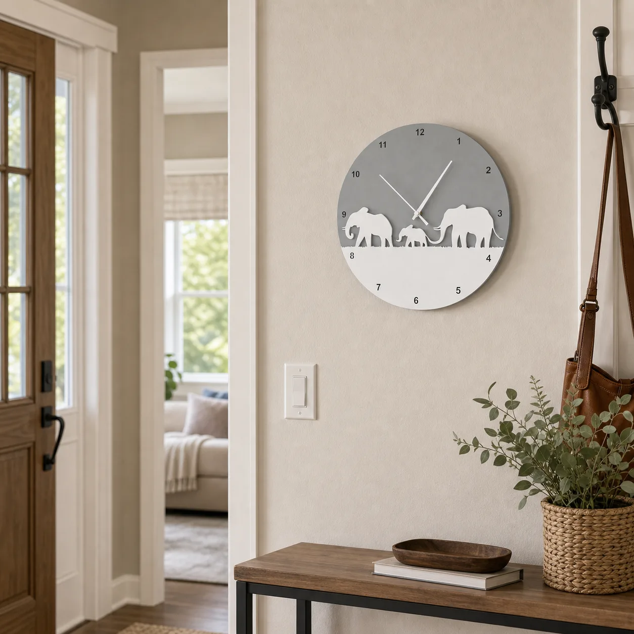 Modern Elephant Family Wall Clock in a Suburban Entryway Modern elephant family wall clock mounted above an entryway console table with hooks and natural light