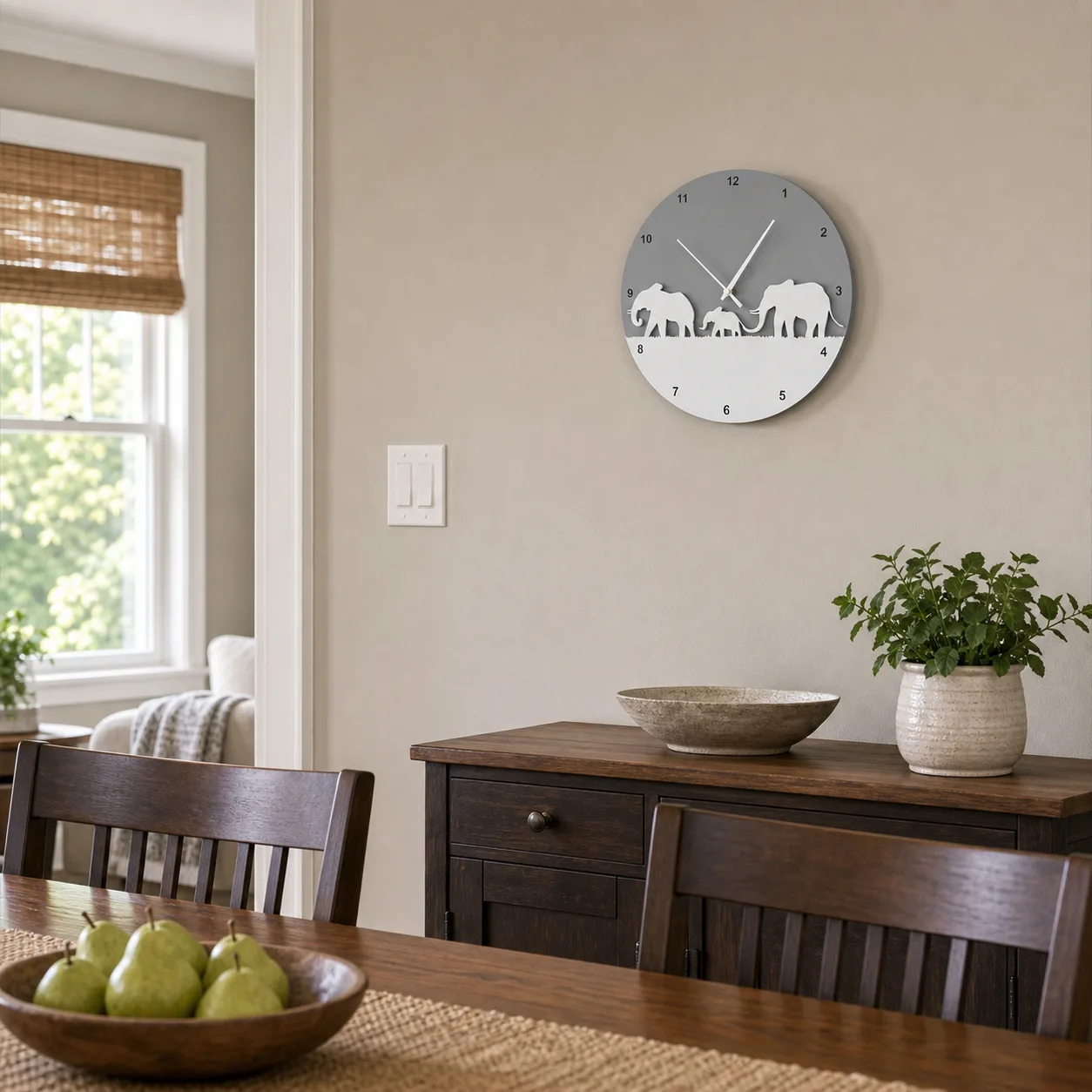 Modern Elephant Family Wall Clock in a Townhouse Dining Room Minimalist elephant family wall clock on a dining room wall above a wood sideboard and table